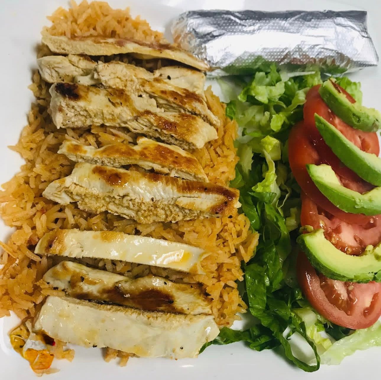 Pollo Asado Con Arroz.